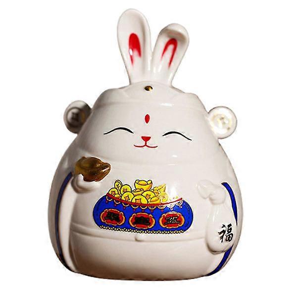 Decorazione di Capodanno con confezione regalo, design dei cartoni animati, ceramica, decorazione della scrivania bianca