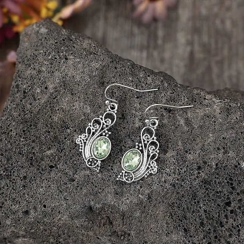 Cross-border new style silver classic hollow pattern inlaid emerald earrings