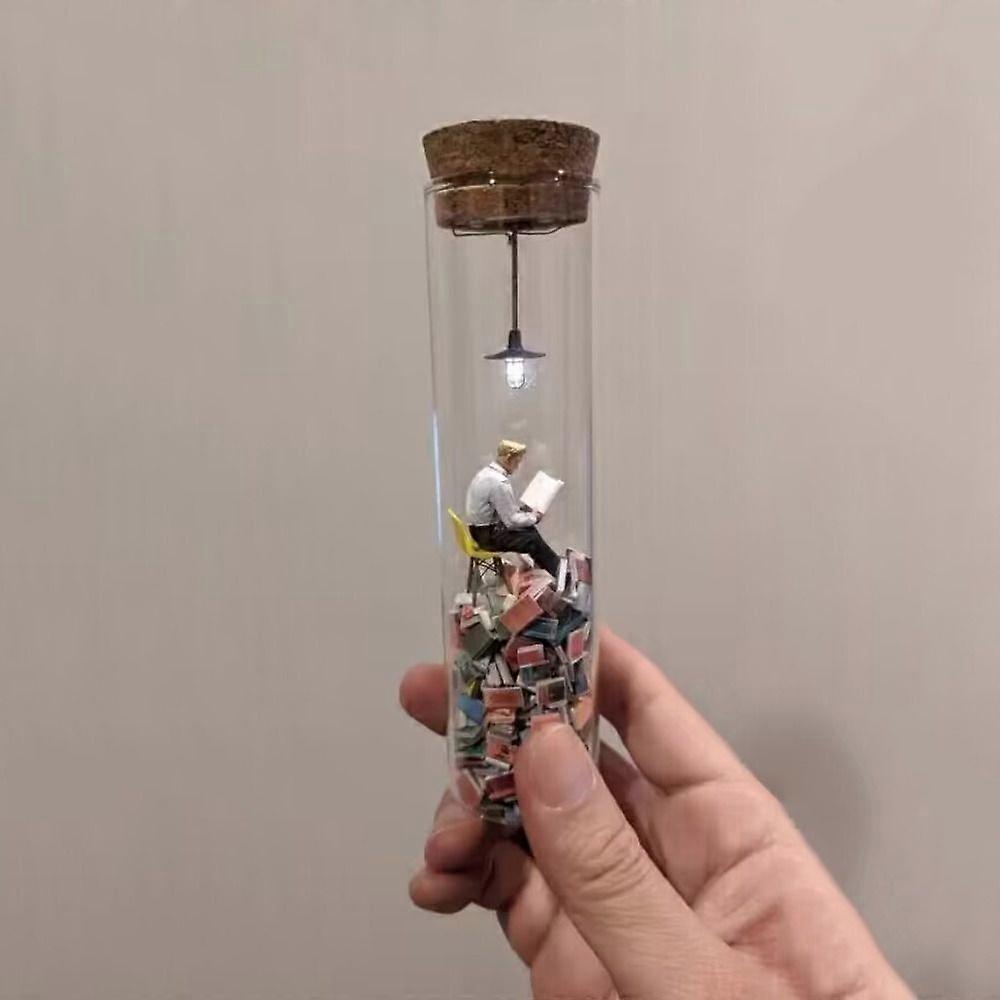A Reading Man in a Test Tube Perspective Drawing Resin Reader Model Book Club Shelf Diorama Creative Decoration Gift