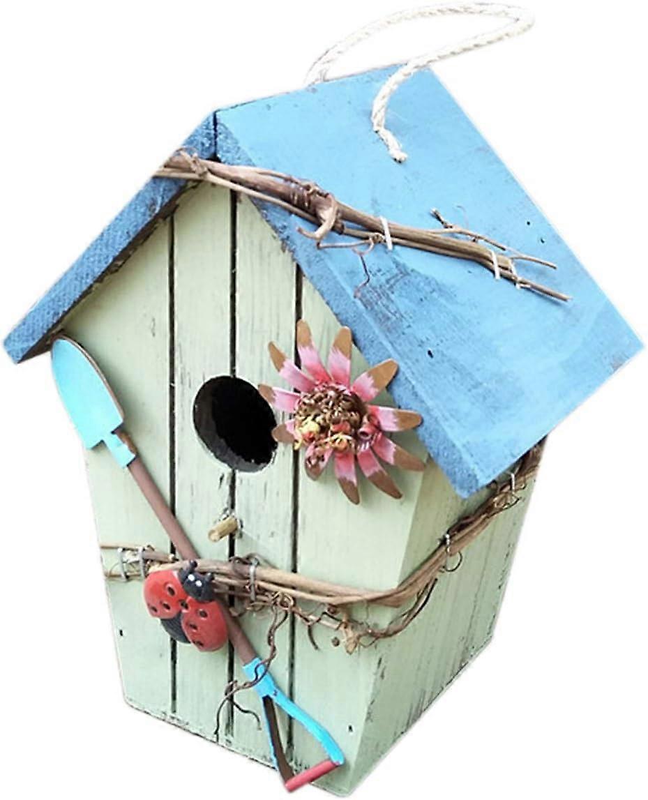 Nichoir en bois suspendu rustique avec toit bleu en pente