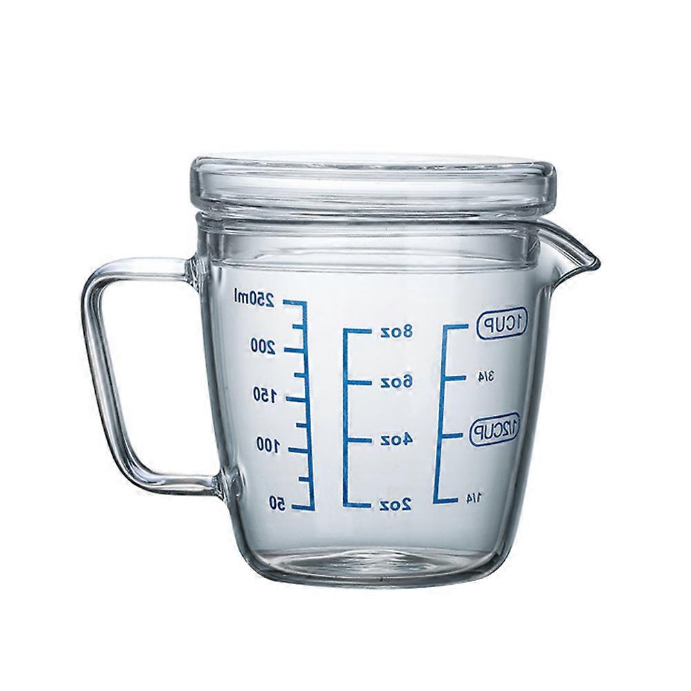 Convenient Transparent Measuring Cup for Home Use with an Ergonomic Shape and Sealed Lid