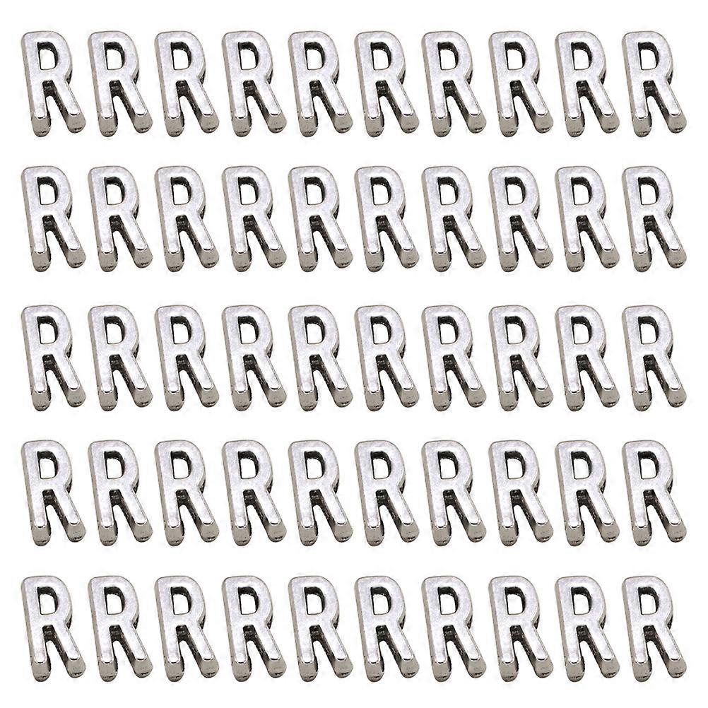 a polished and engaging product description based on your input:

 

**50pcs Alloy English Letter "R" Pendant Charms – Durable & Stylish DIY Jewelry