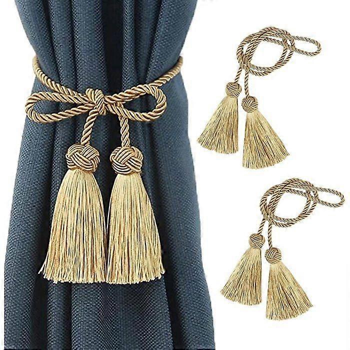 Pair of rope curtain tiebacks with tassels, gold