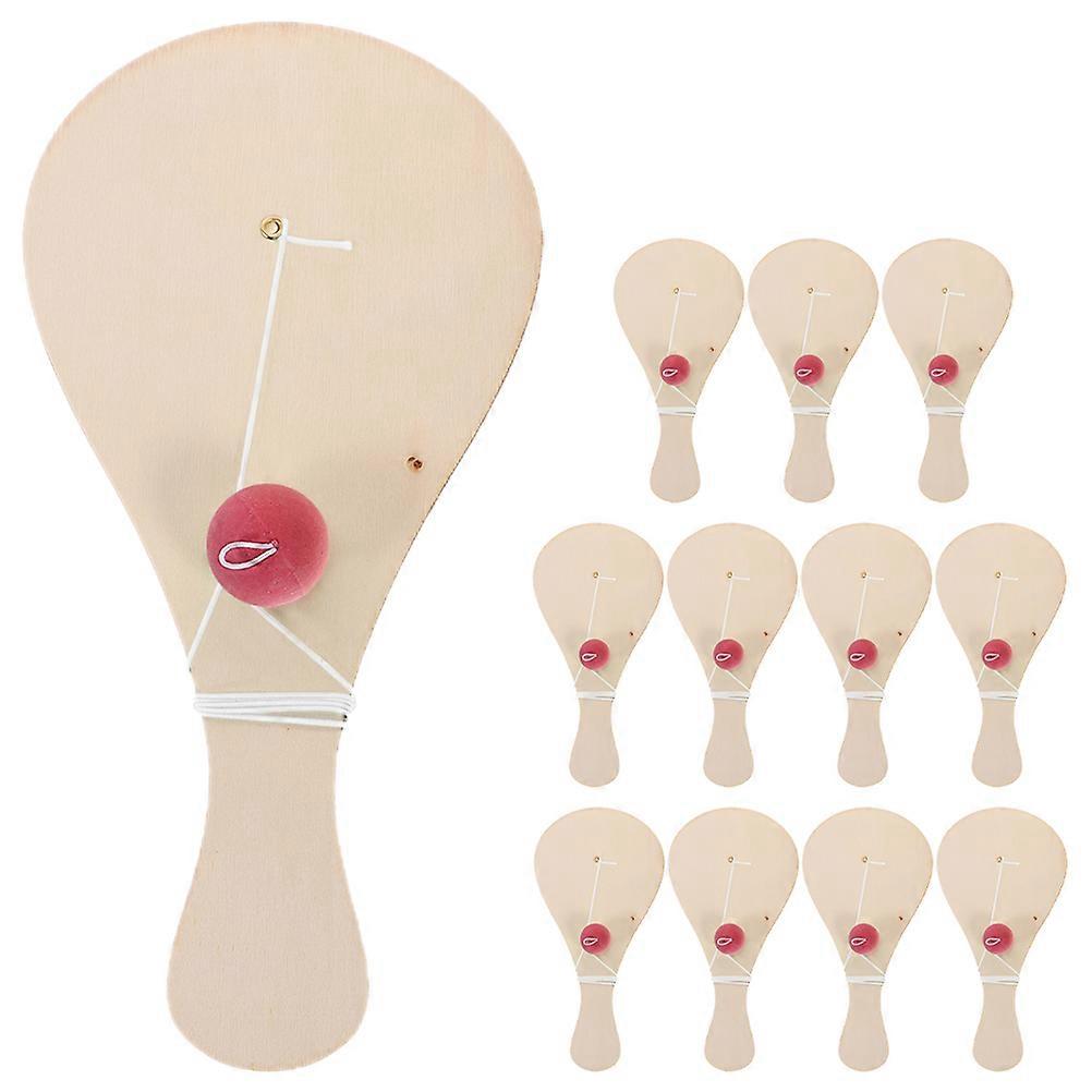 12pcs Hand-Painted Wooden Paddle Ball Set for Kids DIY Graffiti and Coloring Fun Paddle with String Ball Unfinished Blank Wooden Paddle Toy