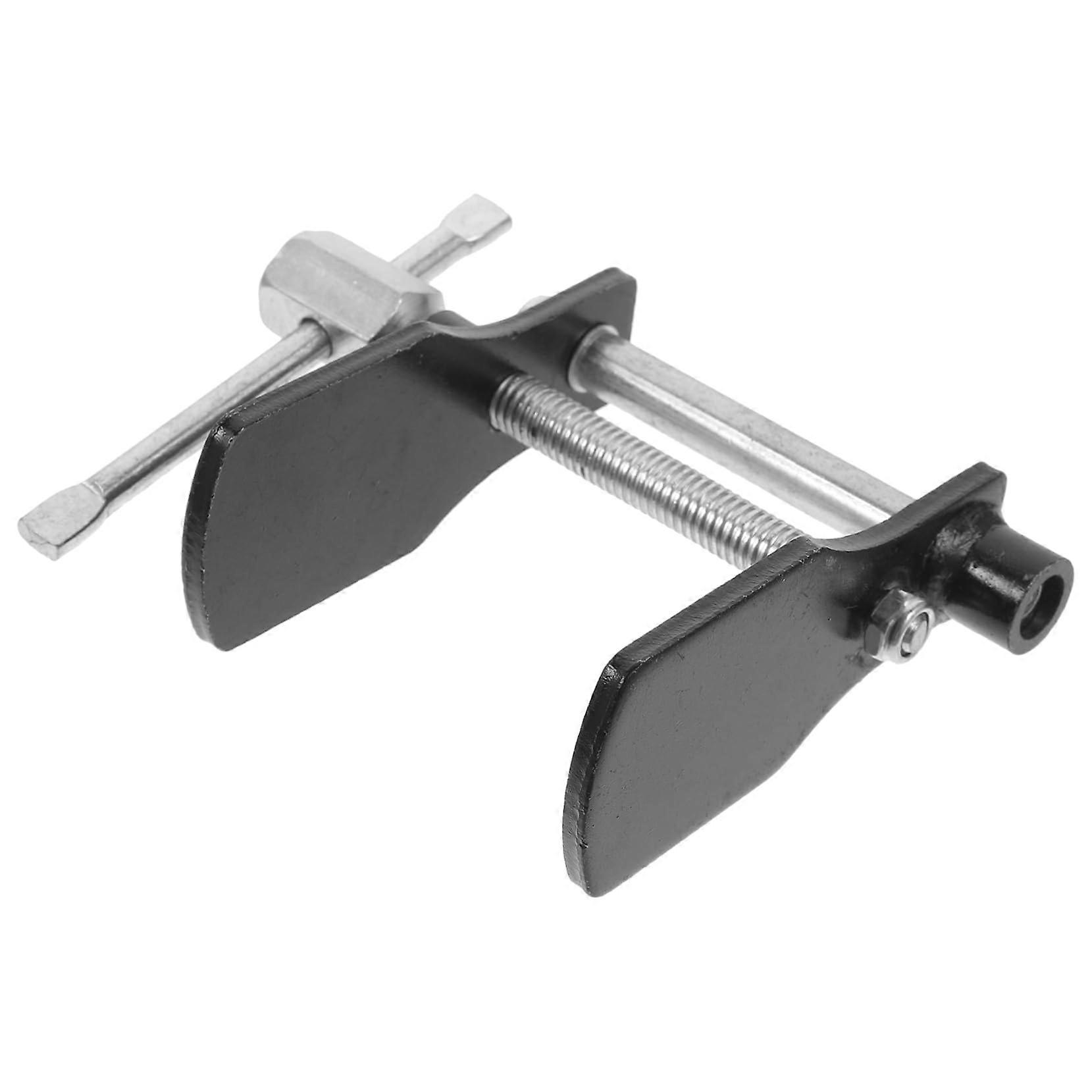 Brake caliper piston compressor tool for car repairs, versatile for passenger cars and trucks.
