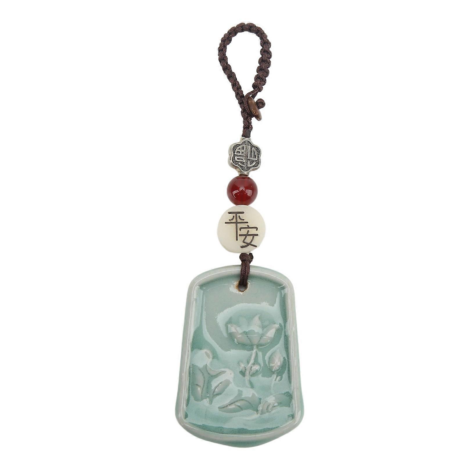 Avaimenperäriipus Hieno retro pieni lumpeenkuvioinen avaimenperä...