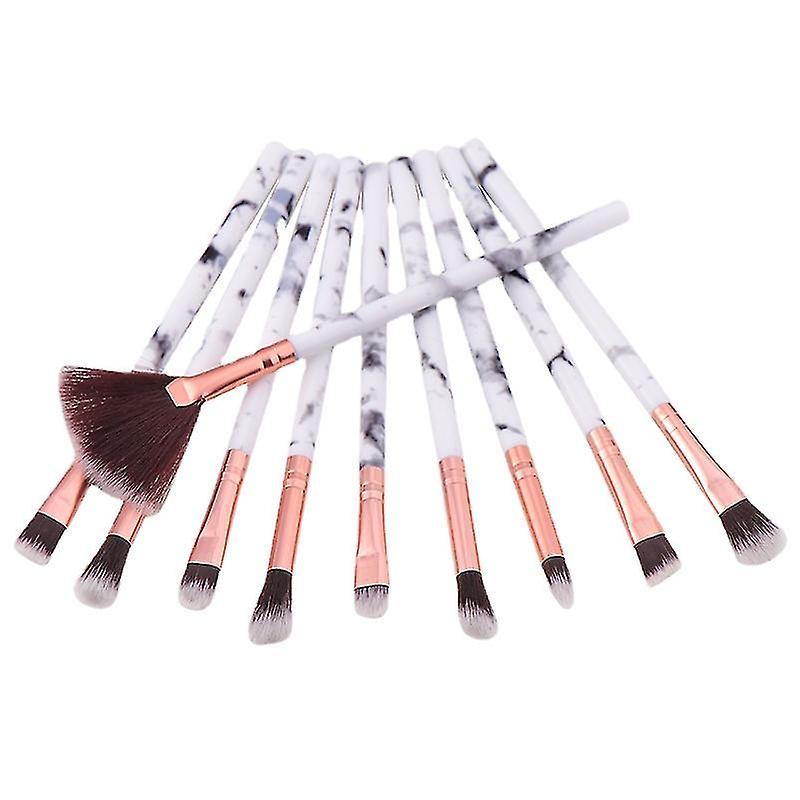 A Set Of 10 Marble Foundation Blush Applicator Brushes