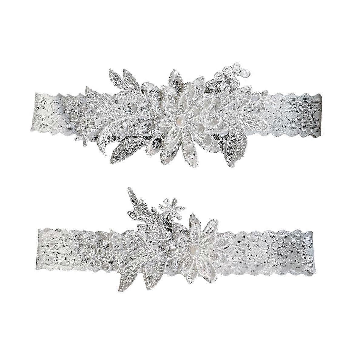 Here's a refined and professional product description based on your input:
**Elegant White Lace Bridal Garter with Artificial Pearl Floral Design