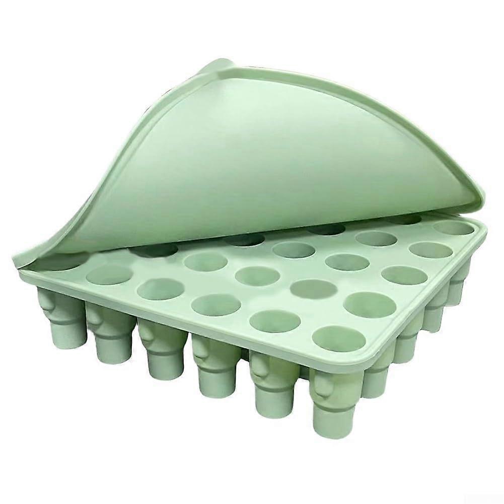 Stylish silicone ice cube tray with lid, a musthave for creating unique ice and desserts with sports motifs (MatchaGreen).