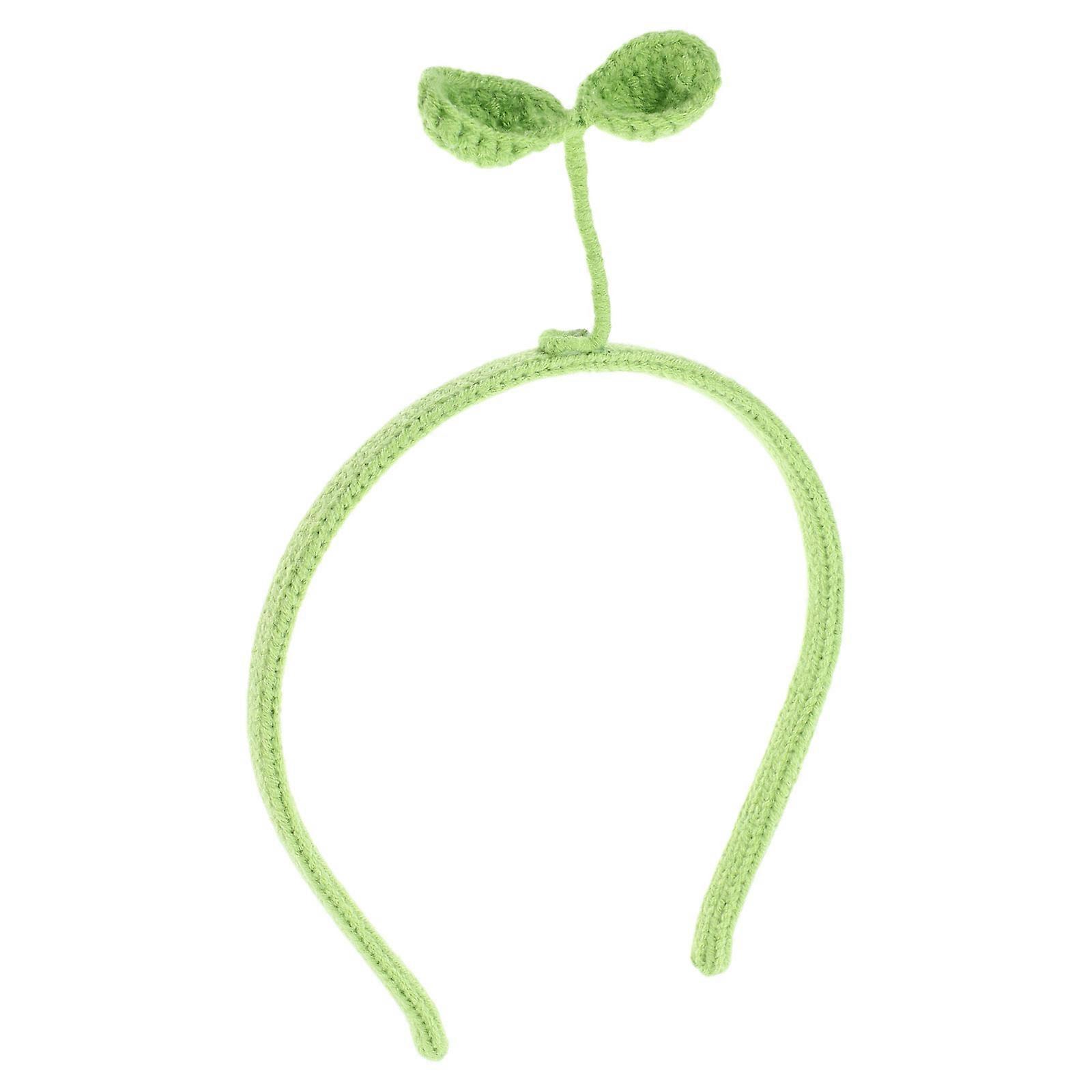Here's a polished and professional product description based on the title you provided:
**Crocheted Sprout Headband – Handmade Yarn Hairband for