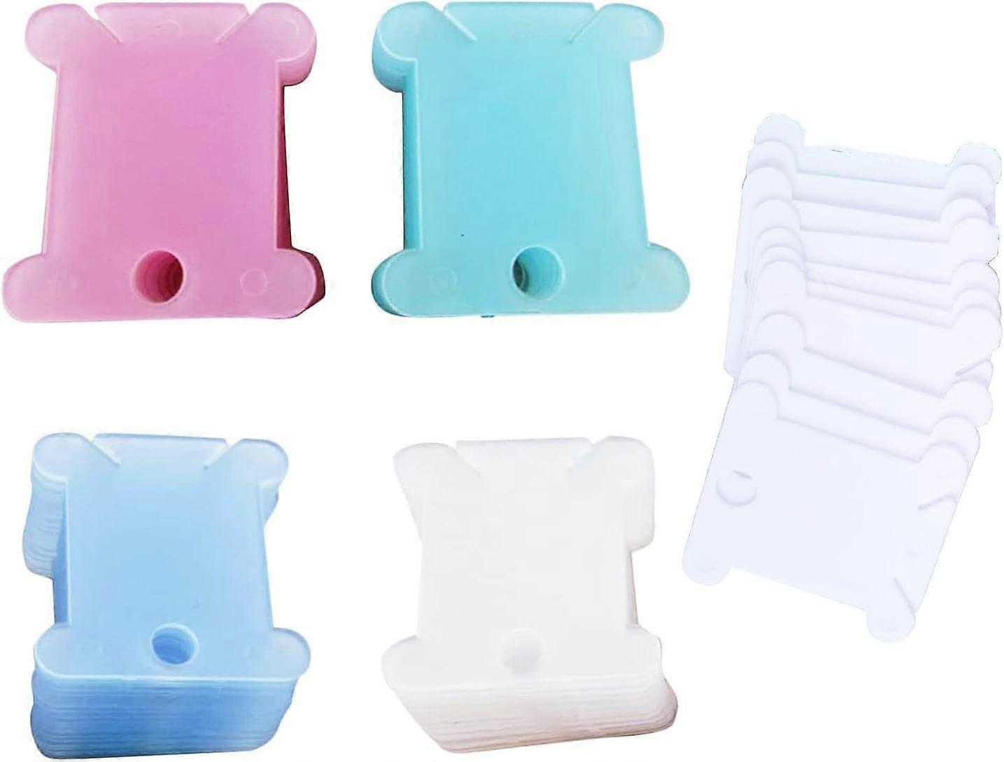 100 pcs plastic bobbin shuttle embroidery cross shuttle for sewing machine accessories
