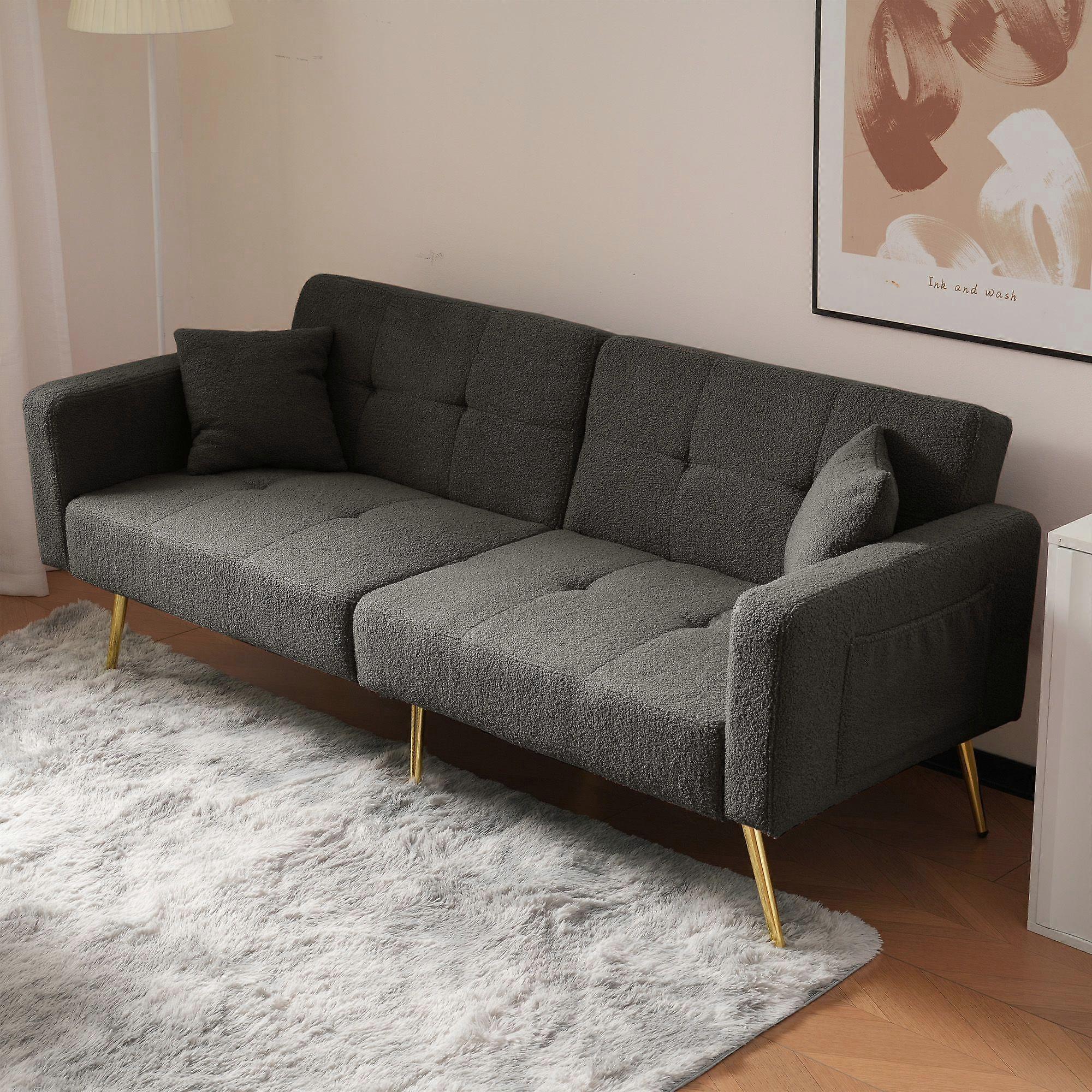 The sofa bed has a bed function, three adjustable backrest angles, gold legs, cushions and side storage pockets