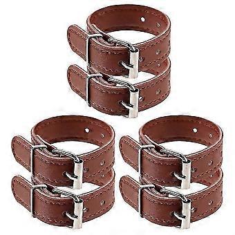 Conjunto de alças de couro ajustáveis ​​para cesta dianteira de bicicleta.