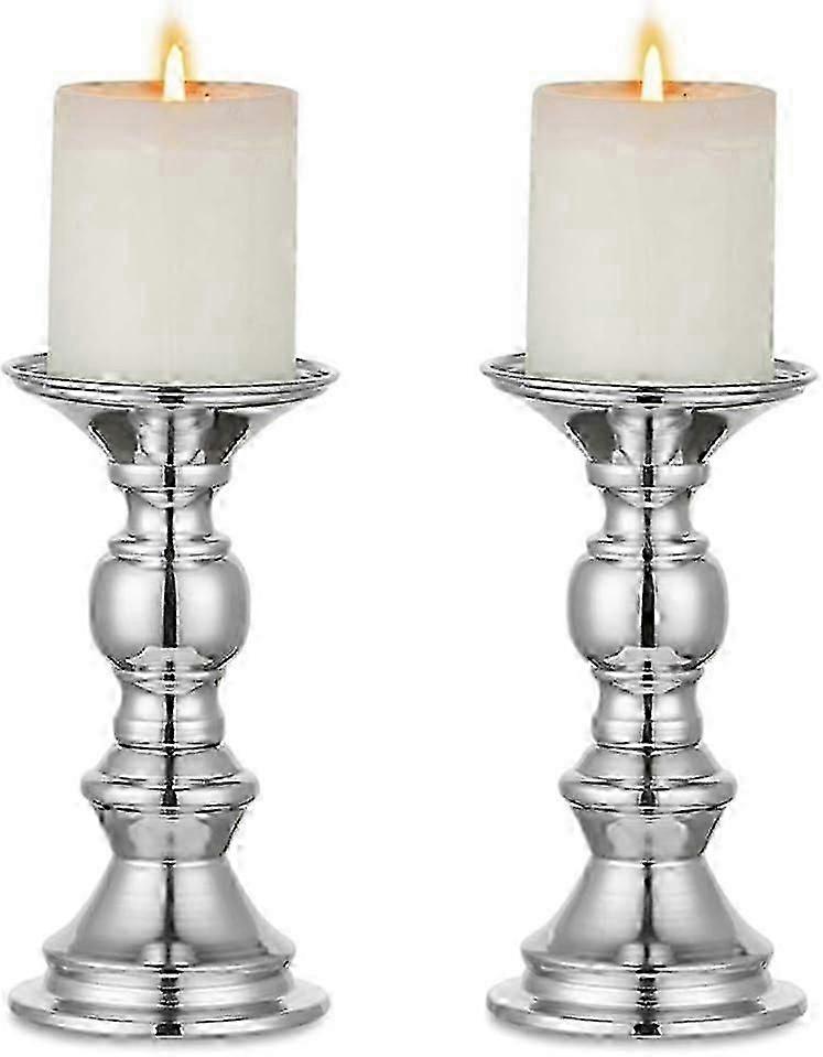 2 tabletop silver column candlesticks