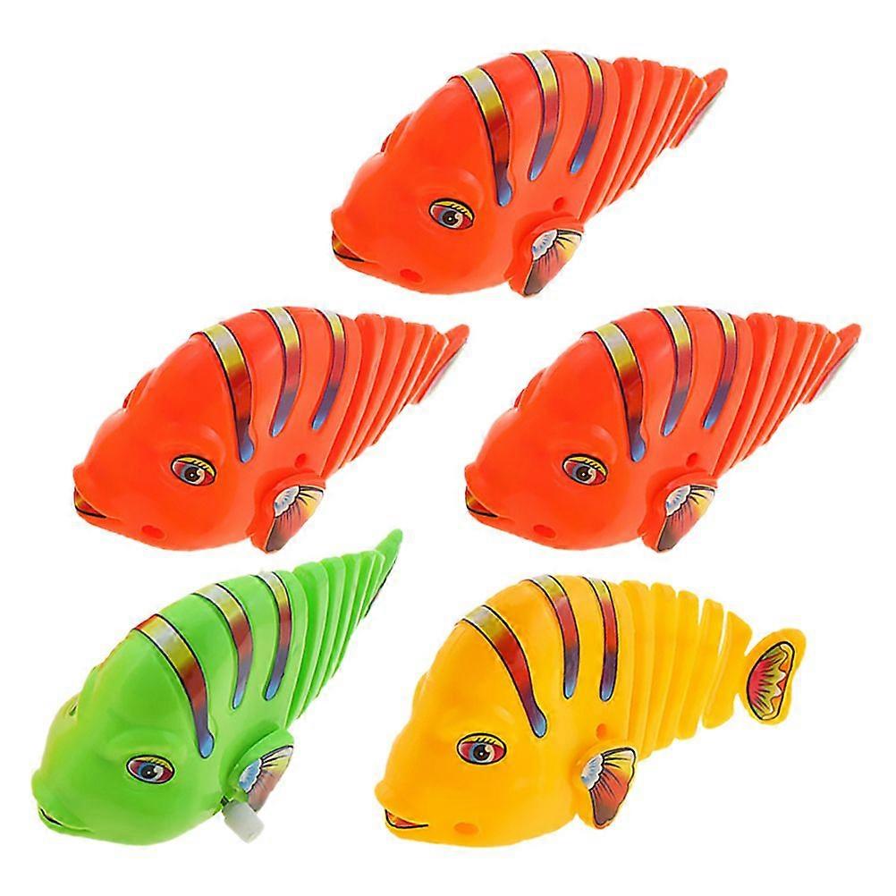 5pcsプラスチック巻き上げ小刻みに揺れる魚のおもちゃ時計仕掛けスイング漫画のおもちゃ魚の巻き上げ魚のおもちゃ