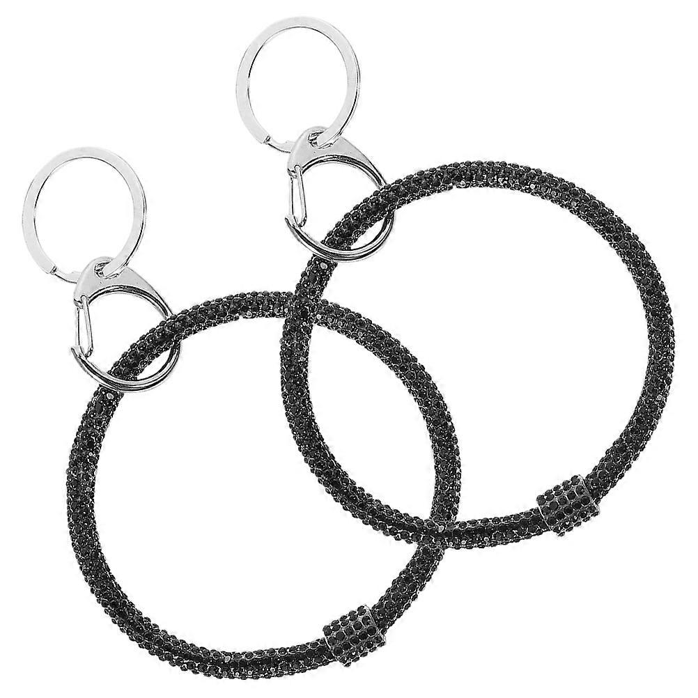 Here's a refined and engaging product description for your **2pcs Bling Rhinestone Wristlet Keychains**:
✨ **2pcs Bling Rhinestone Wristlet