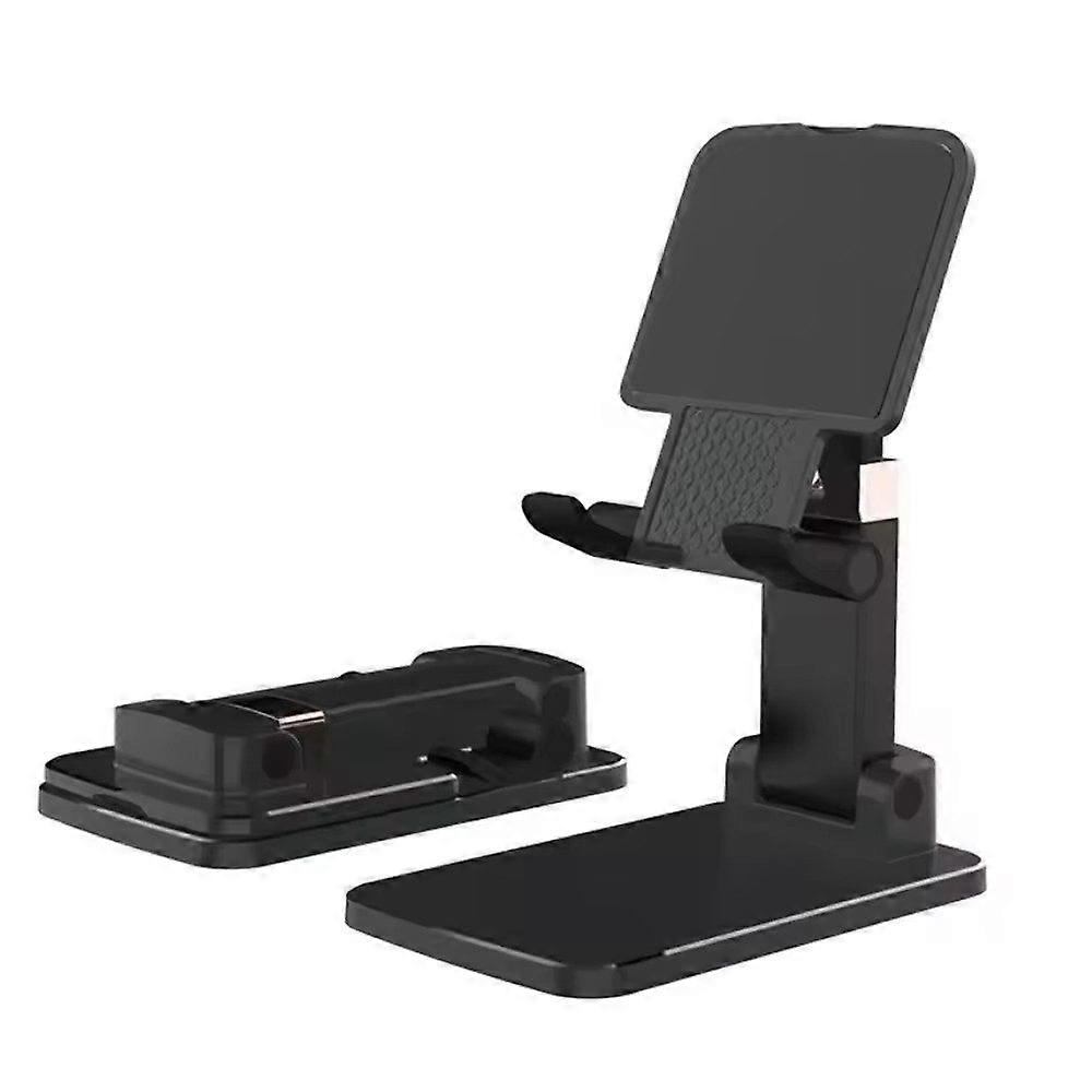 One-piece desktop cell phone holder, portable foldable cell phone holder, compact efficient design.