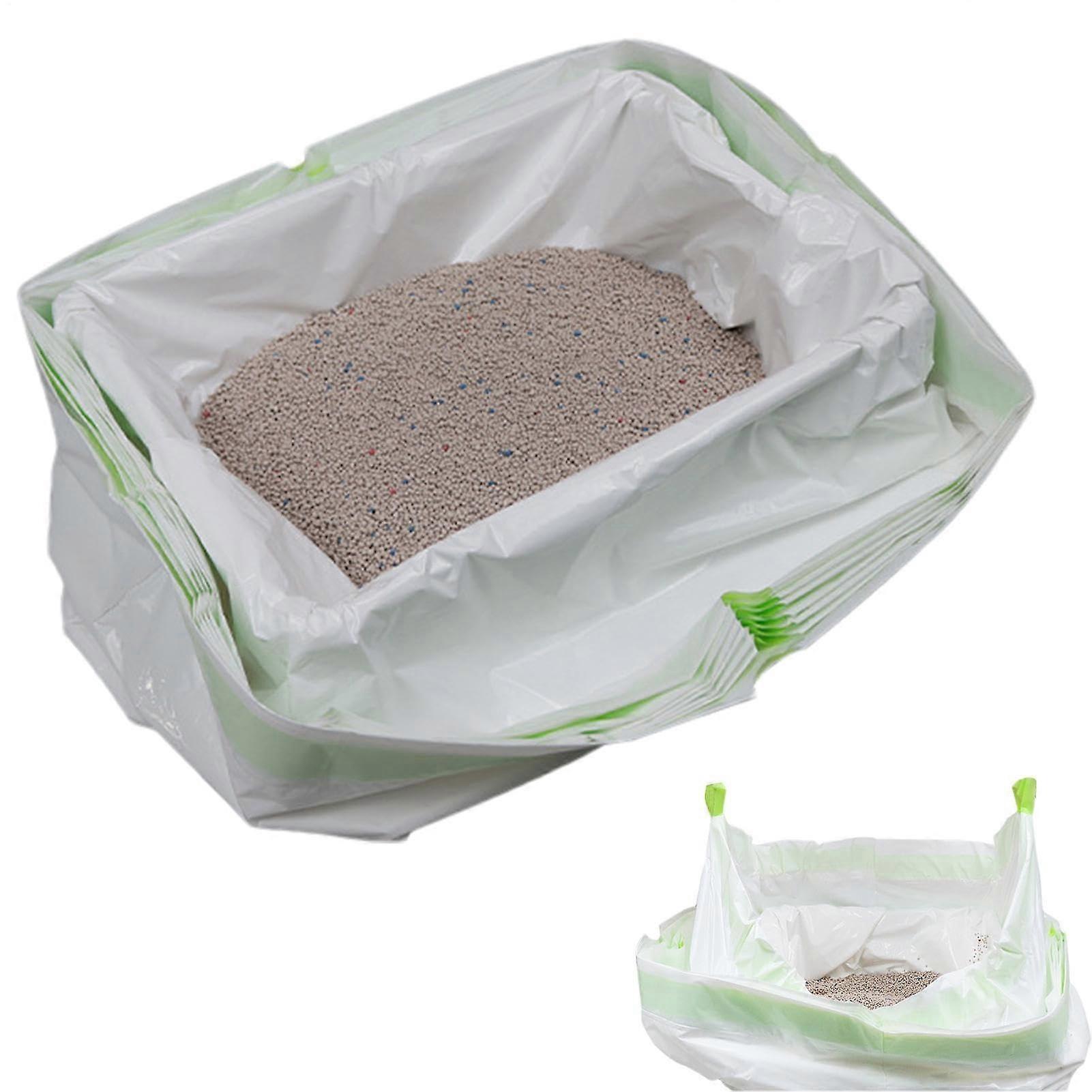 Cat litter bag with scoop, spread function, filter holes, and drawstring handle.