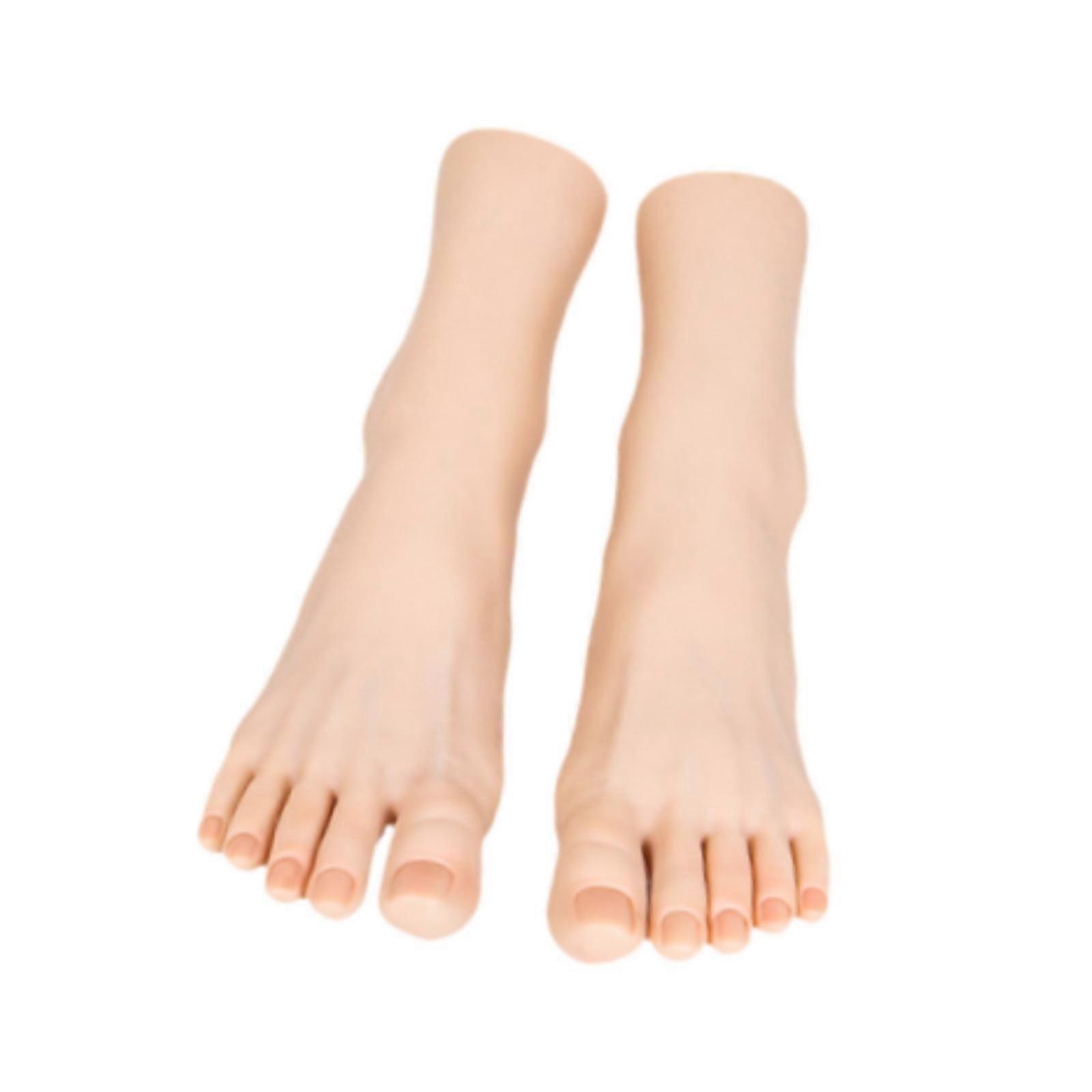 女性のマネキンの足は、ジュエリーのつま先リングの靴のためのネイルアートフットモデルを表示します