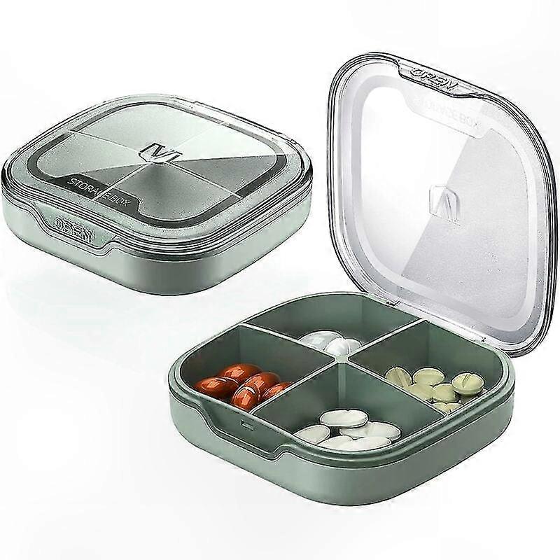 Portable medicine box with four compartments
