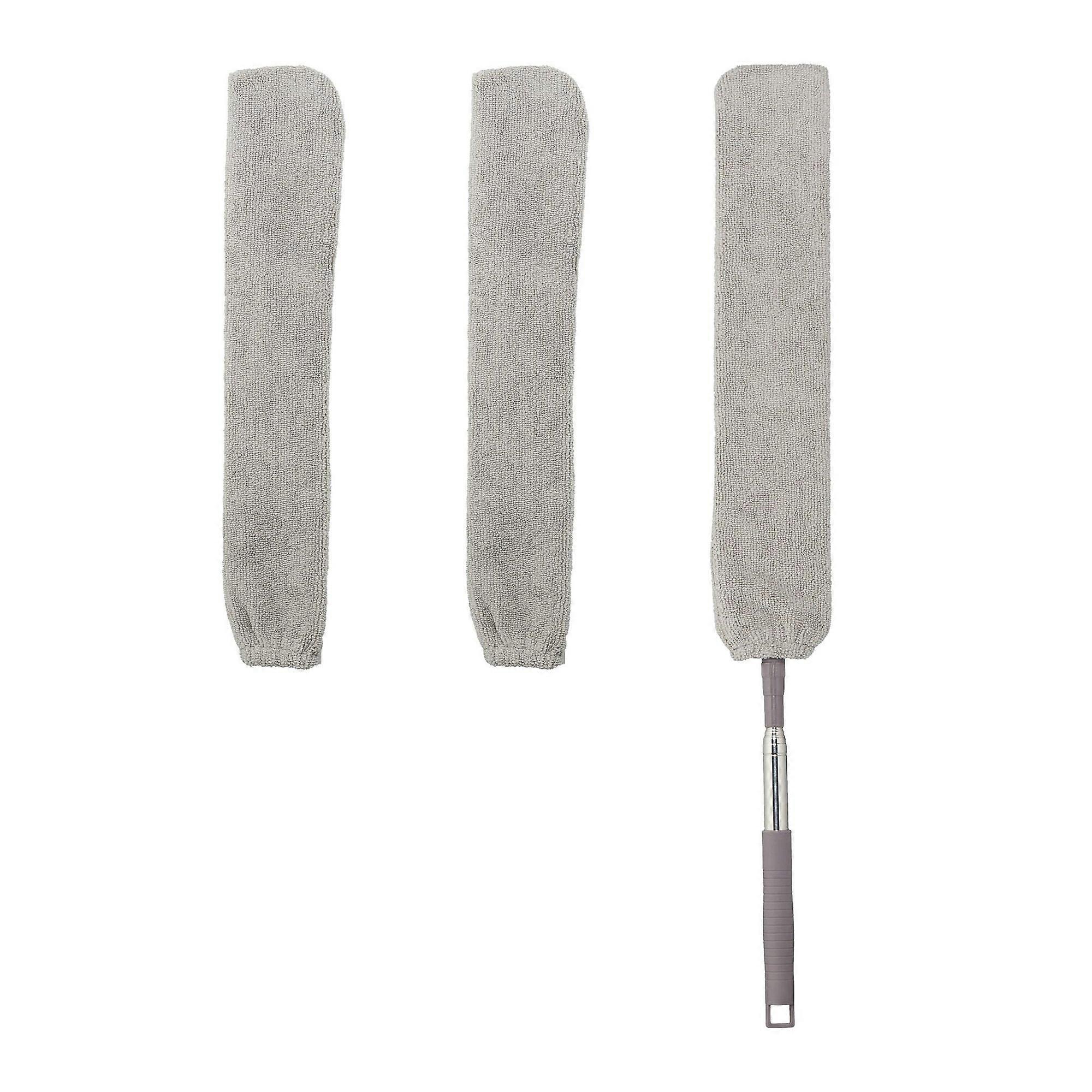 Flat spring vacuum cleaner with telescopic handle