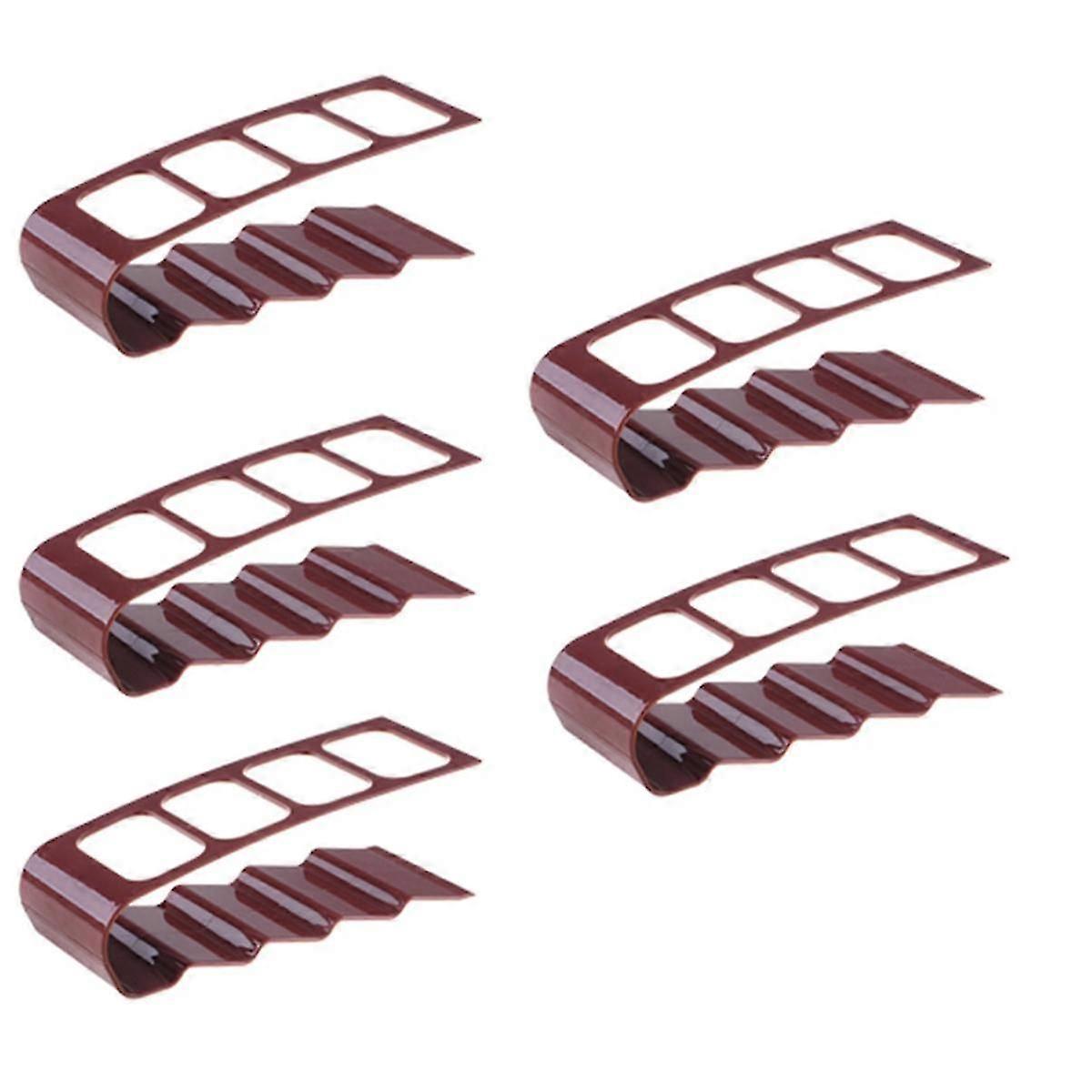 Storage rack for TV and household remote controls