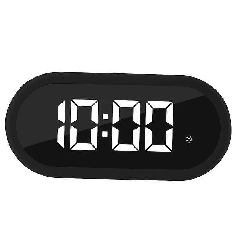 Small digital LED alarm clock with snooze Easy to set Full range dimmer Adjustable alarm volume with 5 alarm sounds Charging