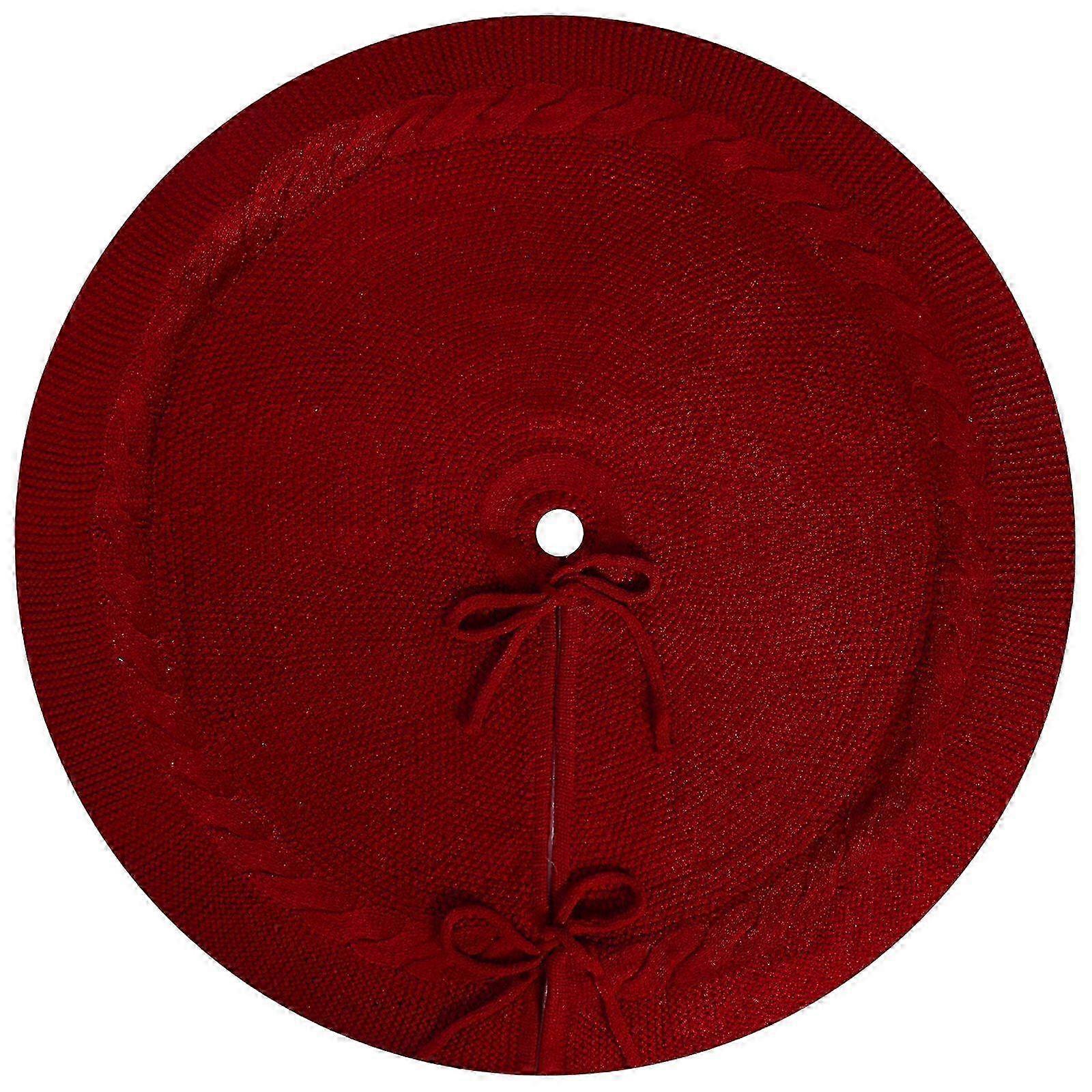 Knitted Christmas tree skirt for festive decoration available in various sizes and two colors