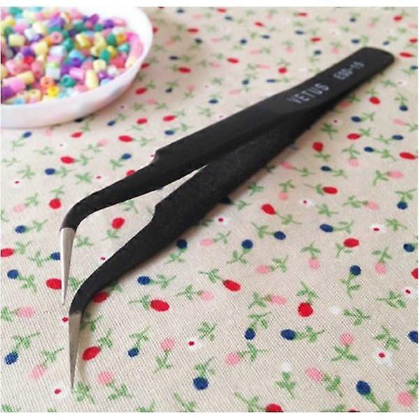 Kaarevat pinsetit Musta