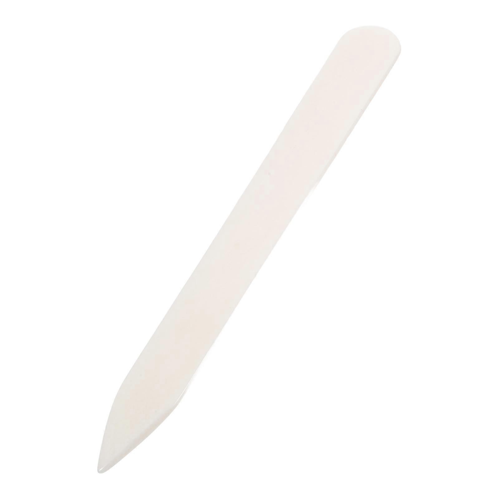 The **Ox Bone Folder** is a highly useful and durable tool in crafting, bookbinding, and paper arts like scrapbooking. Here's a breakdown of its