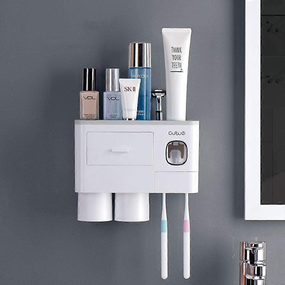 Automatic toothpaste dispenser with wall-mounted toothbrush holder