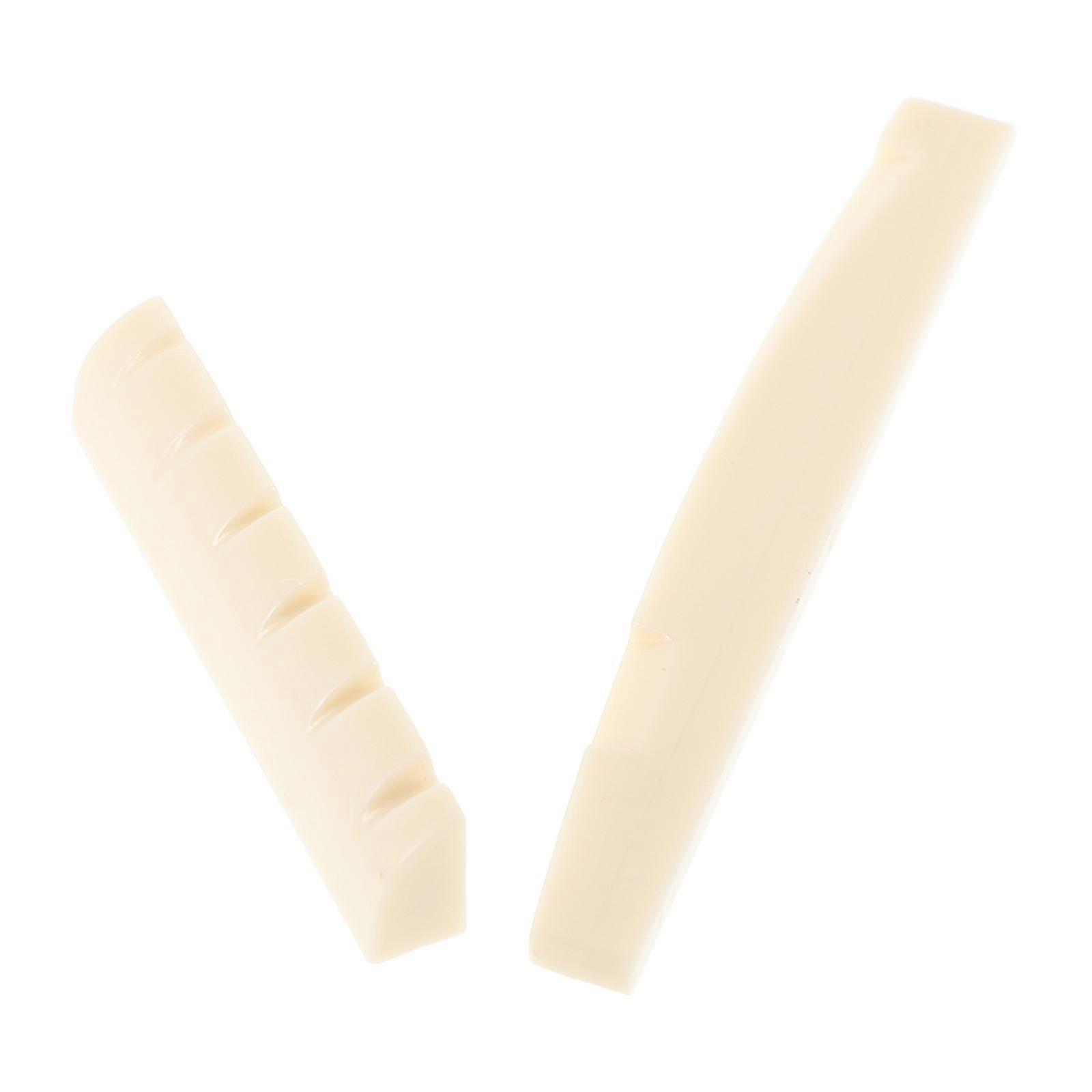 The **2pcs Plastic Bridge Saddle And Nut Replacement Kit For Acoustic Folk Guitar** is a practical and solution for maintaining or upgrading your