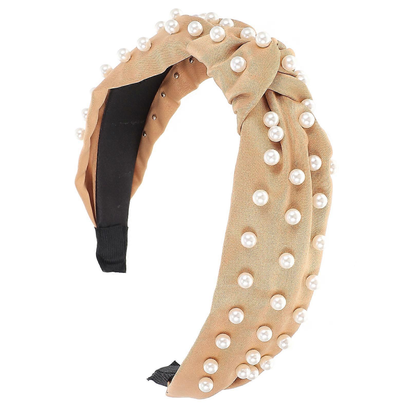 Here's a refined and appealing product description based on your input:
**Lovely Pearl Knot Headband for Women – Stylish Decorative