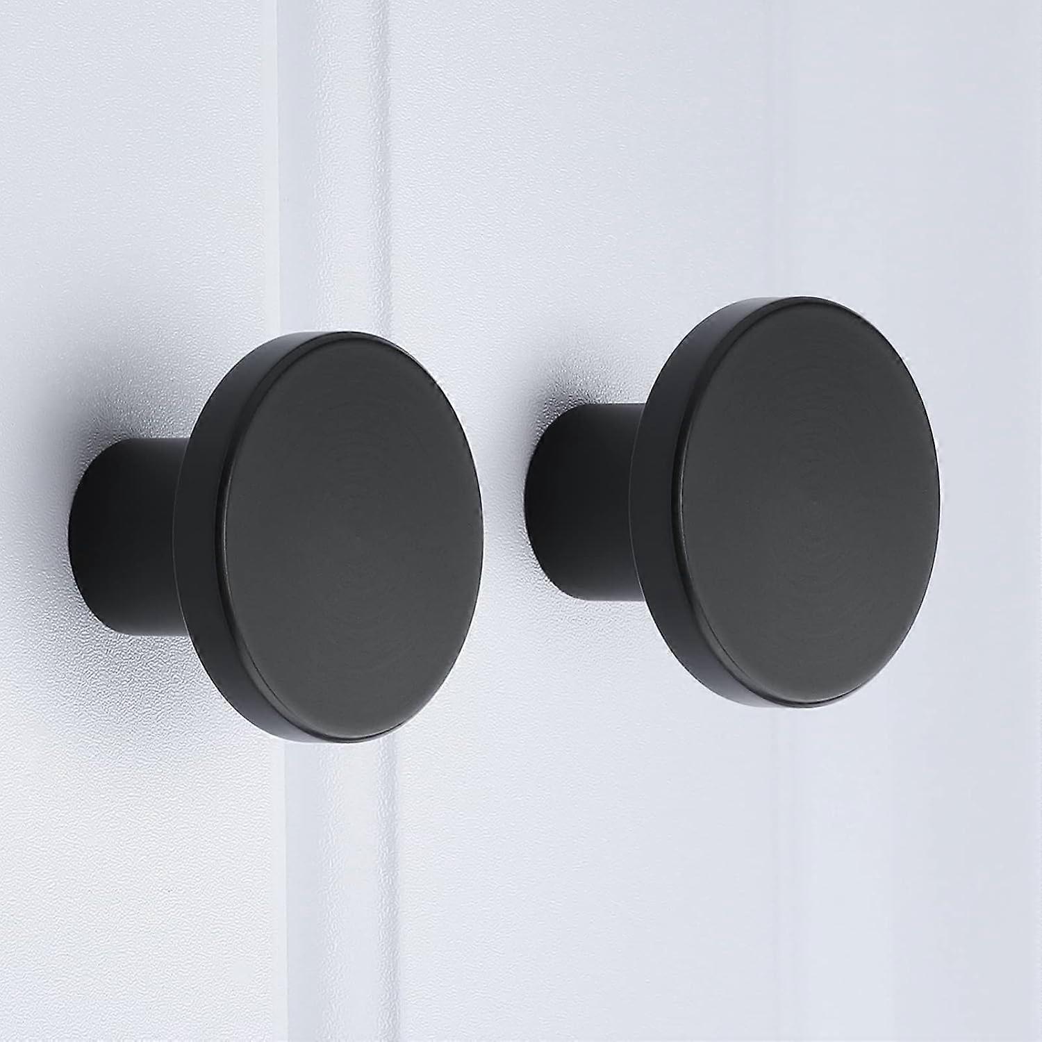 A set of 10 furniture knobs - black