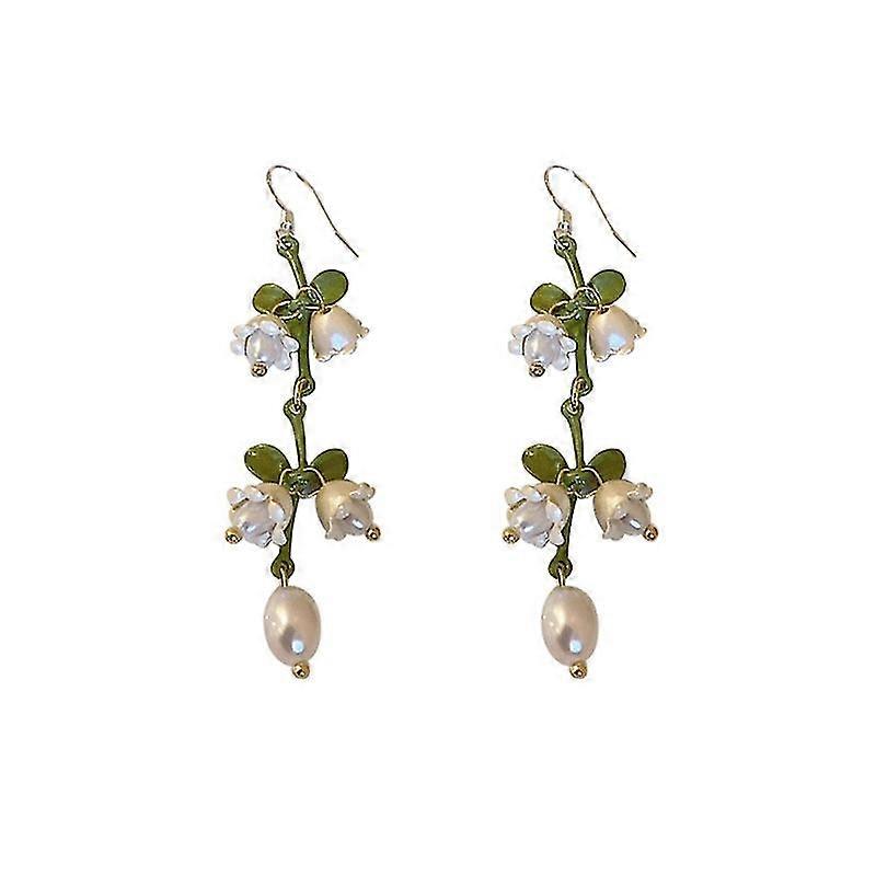 Boucles d'oreilles rétro françaises élégantes en forme de lys blanc dans la vallée, niche douce et délicate