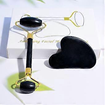Set met jade rollers en gua sha gezichtstools voor verkoelende massage en het verminderen van wallen, klaar om cadeau te geven.
