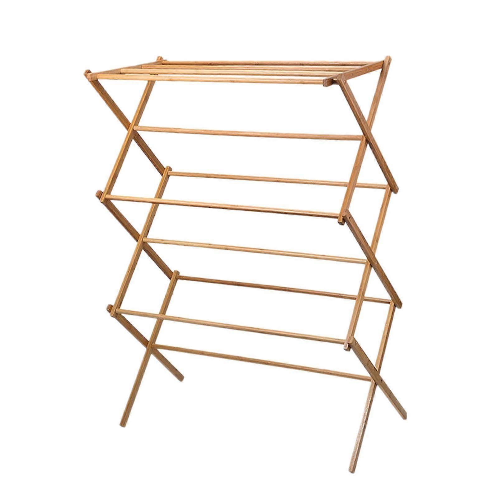 床の洋服ラック折り畳まれたランドリー服スタンドアパートのバルコニーパティオ