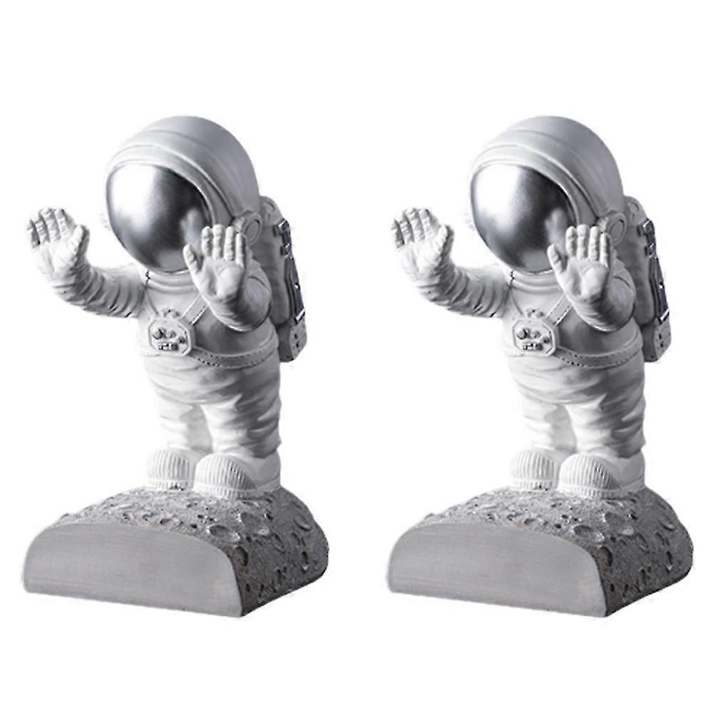 2pcsクリエイティブレジン宇宙飛行士ブックエンド卓上ブックオーガナイザー宇宙飛行士フィギュアデスクブックエンドオフィ