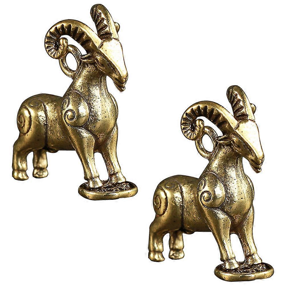 Here's a refined and professional product description based on the details you provided:
 
**2pcs Vintage Brass Sheep Pendants – Unique DIY Hanging
