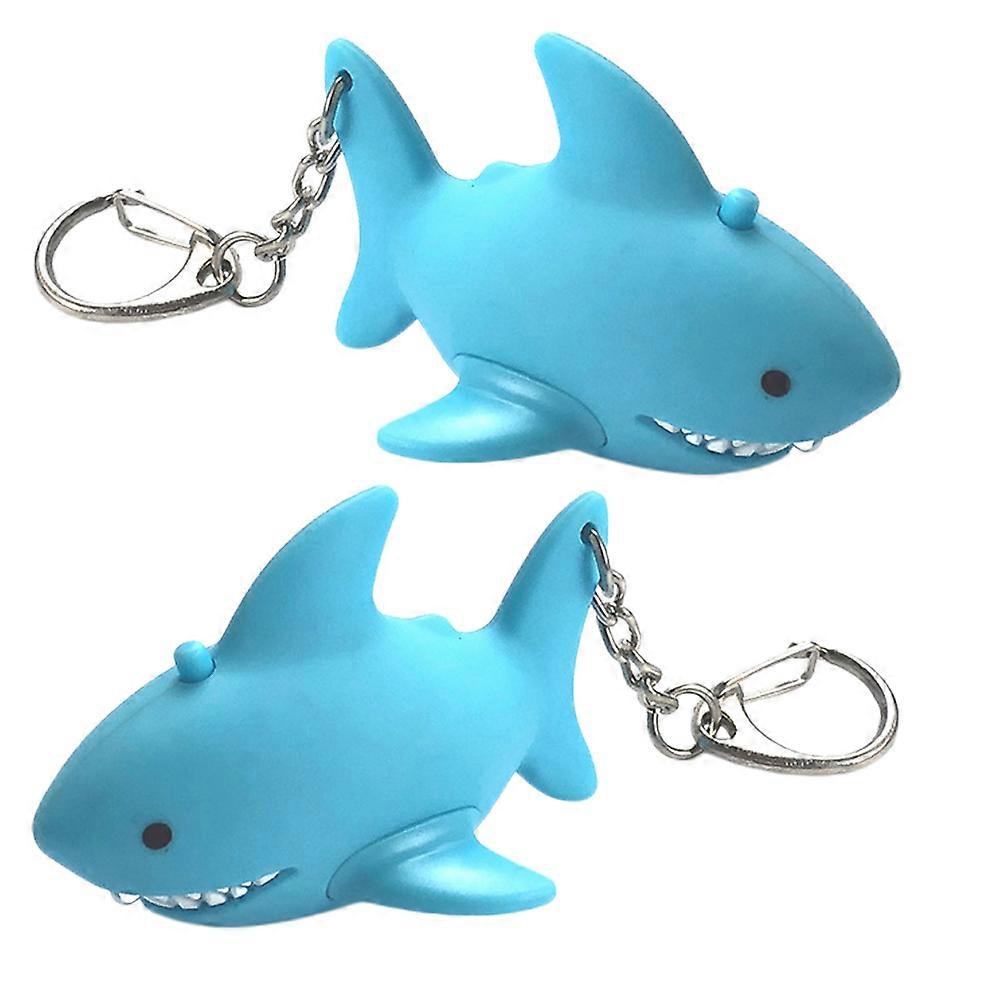 It looks like your message got cut off, but with the product description or any questions you might have about **"2pcs Shark Keychain Pendant Cartoon