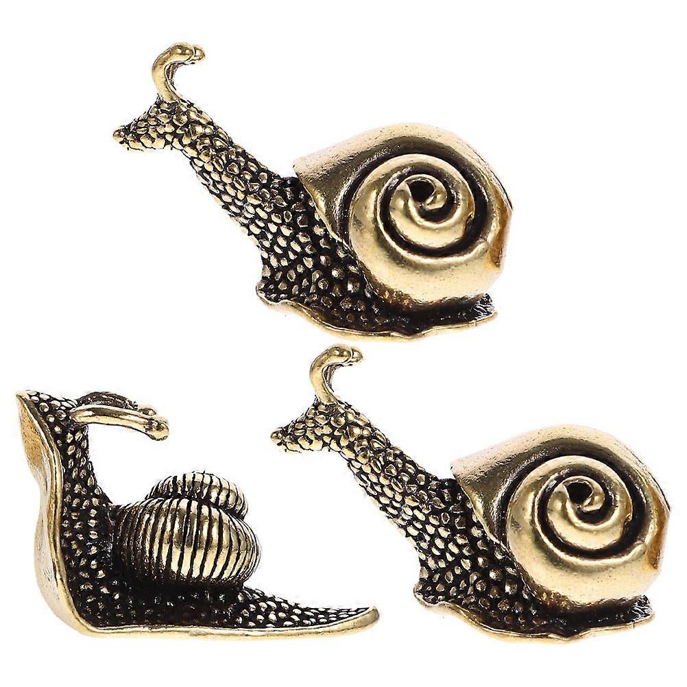 a refined product description for your **3pcs Snail Statue Decor – Antique Brass Figurines**:

 

### 🐌 **3PCS Snail Statue Decor – Antique Brass