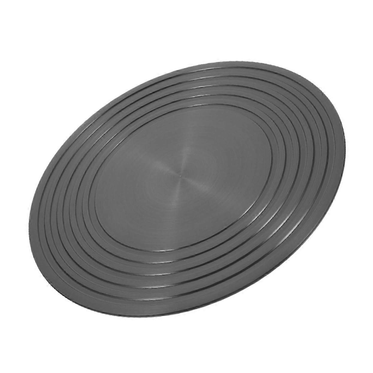 Gas stove heat diffuser plate in black for slow cooking and thawing, prevents hotspots and ensures even heat distribution.