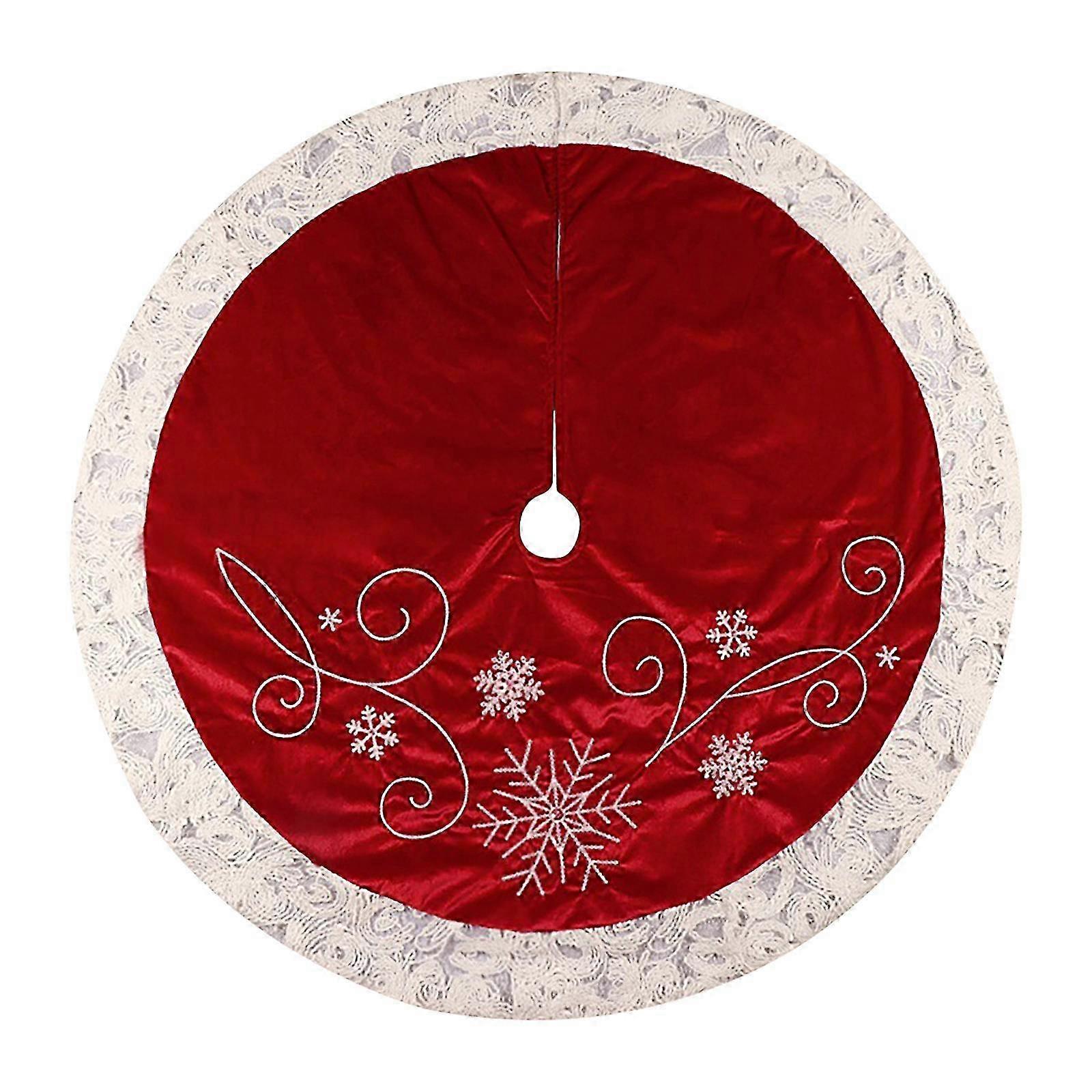 Cedar garland tree skirt for Christmas with red ornaments theme