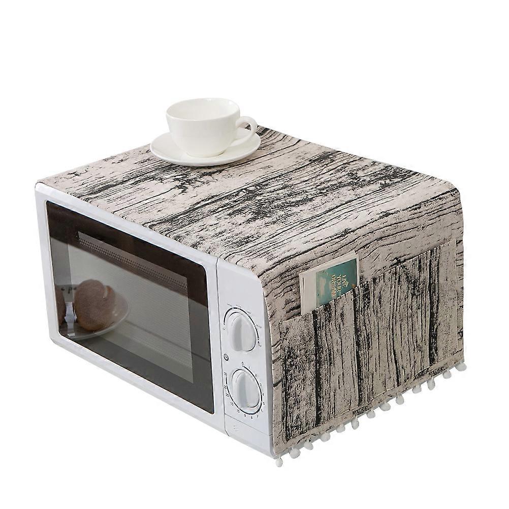 Textured Oven Cover Combining Practical Protection and Artistic Decoration