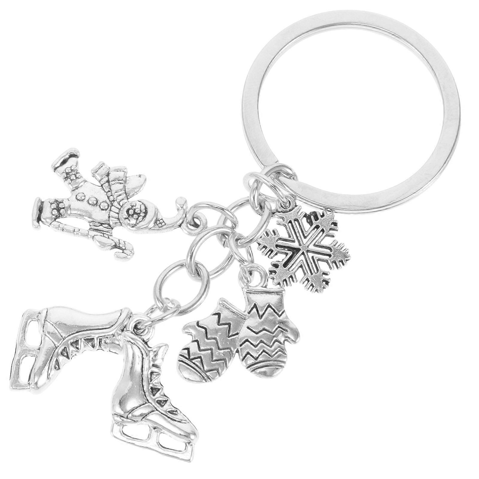 Here's a refined and engaging product description for your **Ice Skate Keychain with Snowflake Skier Motifs**:
 
### ❄️ **Ice Skate Keychain with