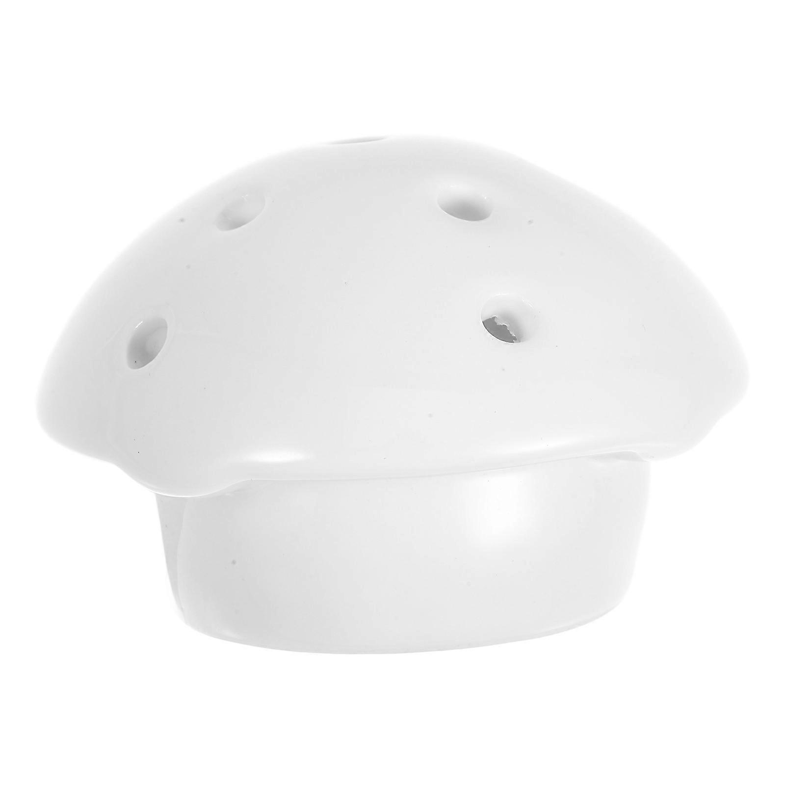 It seems you're referring to a product commonly used in public restrooms — a **ceramic urinal plug stopper / drain cover strainer** designed to act