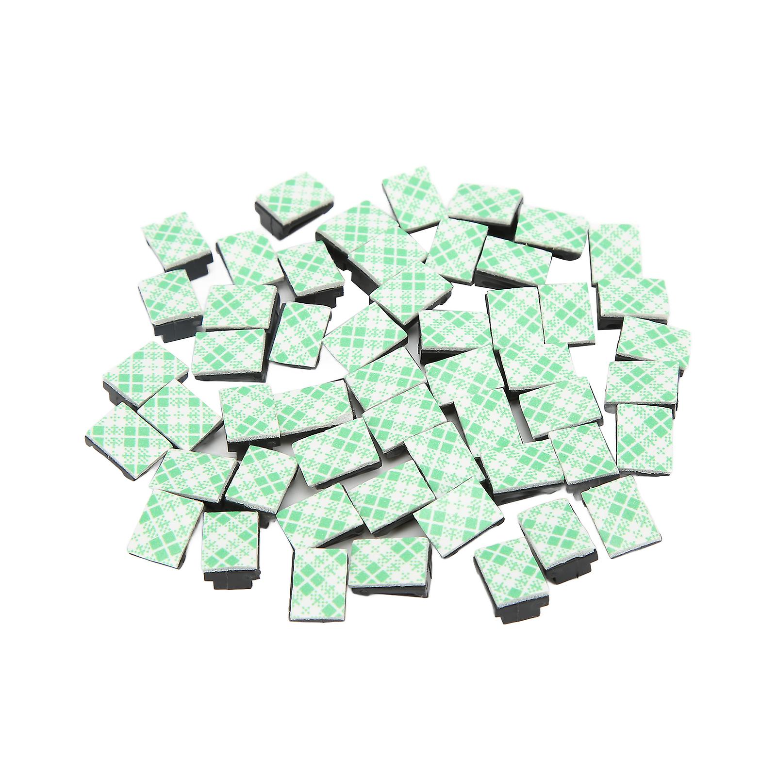 Pack of 50 black self-adhesive cable clips for cables up to 2.5 mm wide