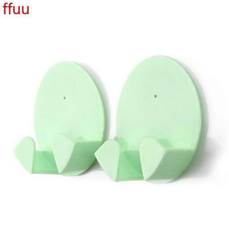 Two practical glue hooks, plug hooks, for household use, colors are random.