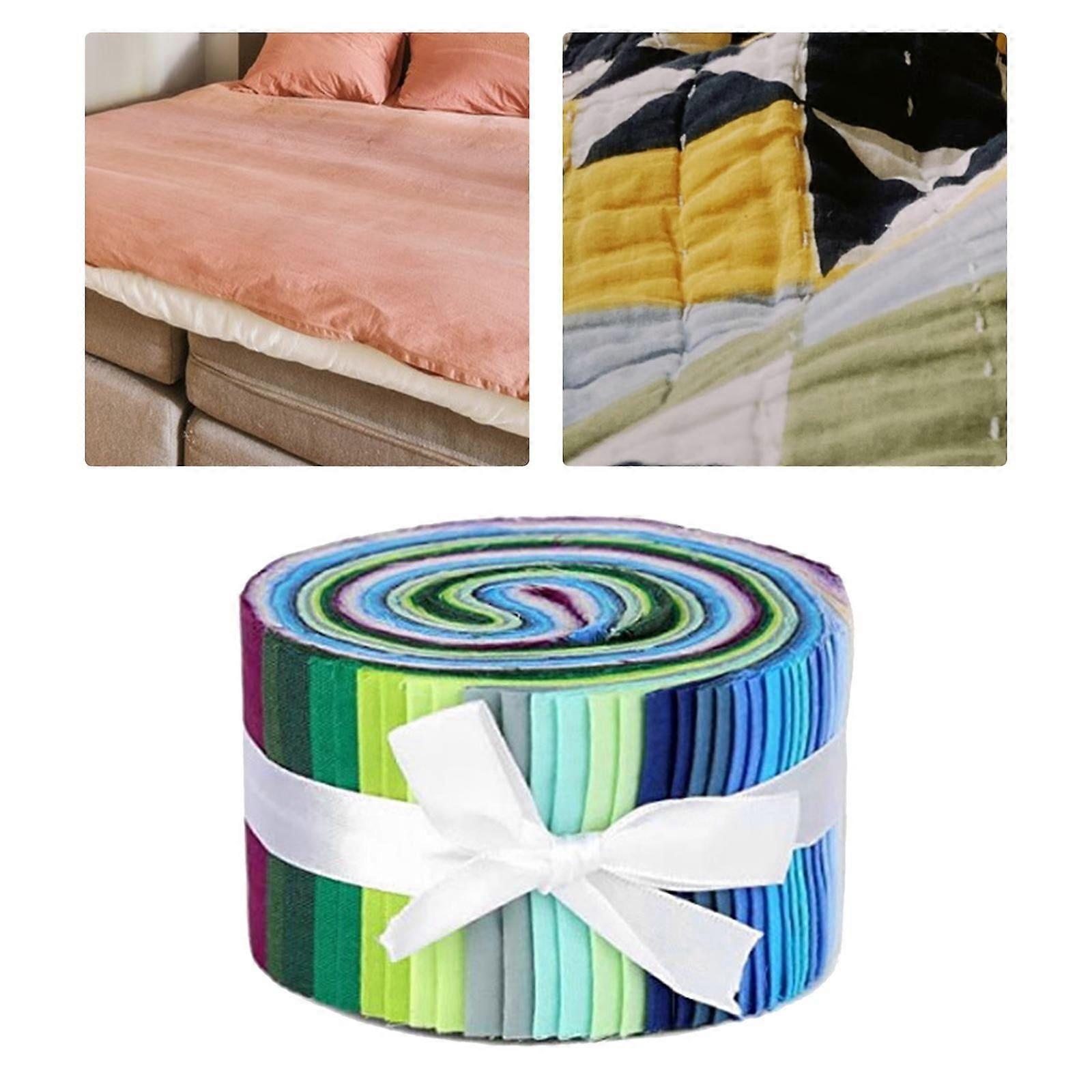 Bundel van 36 stuks quiltstof op rol met verschillende kleurpatronen en patchwork-look.