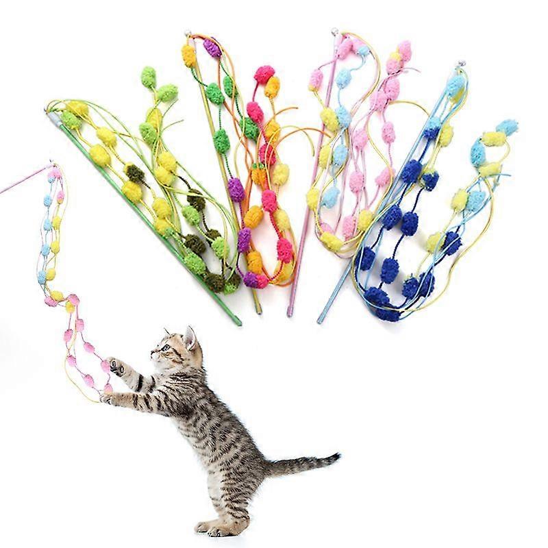 Colorful cotton balls and wool to amuse cats. Colorful cotton balls and bells to relieve boredom. Cat toys